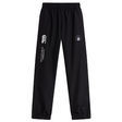 The Helena Youth Rugby Cuffed Hem Stadium Pant by EMB Canterbury features an elastic waistband and cuffs, adorned with the Canterbury of New Zealand logo and a circular emblem on the right leg. These black track pants are perfect for rugby enthusiasts, offering quick-drying comfort and style.