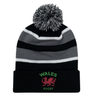 The EMB Augusta Nations of Rugby Wales Hooped Knit Fold Over Pom-Pom Beanie features black, grey, and white stripes, "WALES RUGBY" text, a pom-pom top, and an embroidered red dragon logo on the front.