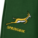 Green fabric with an embroidered yellow and white springbok logo above "SPRINGBOK" in yellow—ideal for rugby practice or pairing with the Nike Springboks Training Pant.