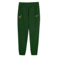 The Nike Springboks Training Pant features a green tapered fit, the official Springboks logo, and a yellow Nike swoosh, inspired by the authentic training gear worn during rugby preparation.