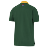 Just in: The Springboks Pique Polo by Nike is a green short-sleeved shirt with a yellow collar, shown from the back and displaying a small South African flag below the neckline.