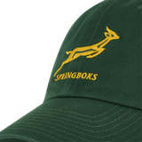 The Springboks Heritage 86 Cap by Nike is a green cap with a yellow springbok antelope and "Springboks" embroidered on the front.
