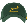 Show your support with the Springboks Heritage 86 Cap by Nike, a green cap featuring a yellow leaping springbok, "SPRINGBOKS" on the front, and the iconic yellow Nike logo on the side.