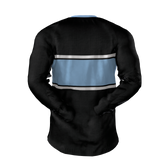 The Columbia Business Gilbert LS Training Tee by Custom GIL AXI features long sleeves, a black base, a wide light blue horizontal stripe, and two thin white stripes across the back.