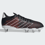 Core black soccer cleat with better scarlet and white streak design, metal studs, and lace-up closure on a white background. These adidas Kakari Elite SG 24 Rugby Cleats are perfect for providing traction in any weather.