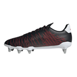 The adidas Kakari SG rugby boots in Core Black/White/Better Scarlet are designed with red zigzag patterns, white accents on the heel, and metal studs on the sole for enhanced traction. Crafted with recycled materials, these boots are perfect for soft ground play.