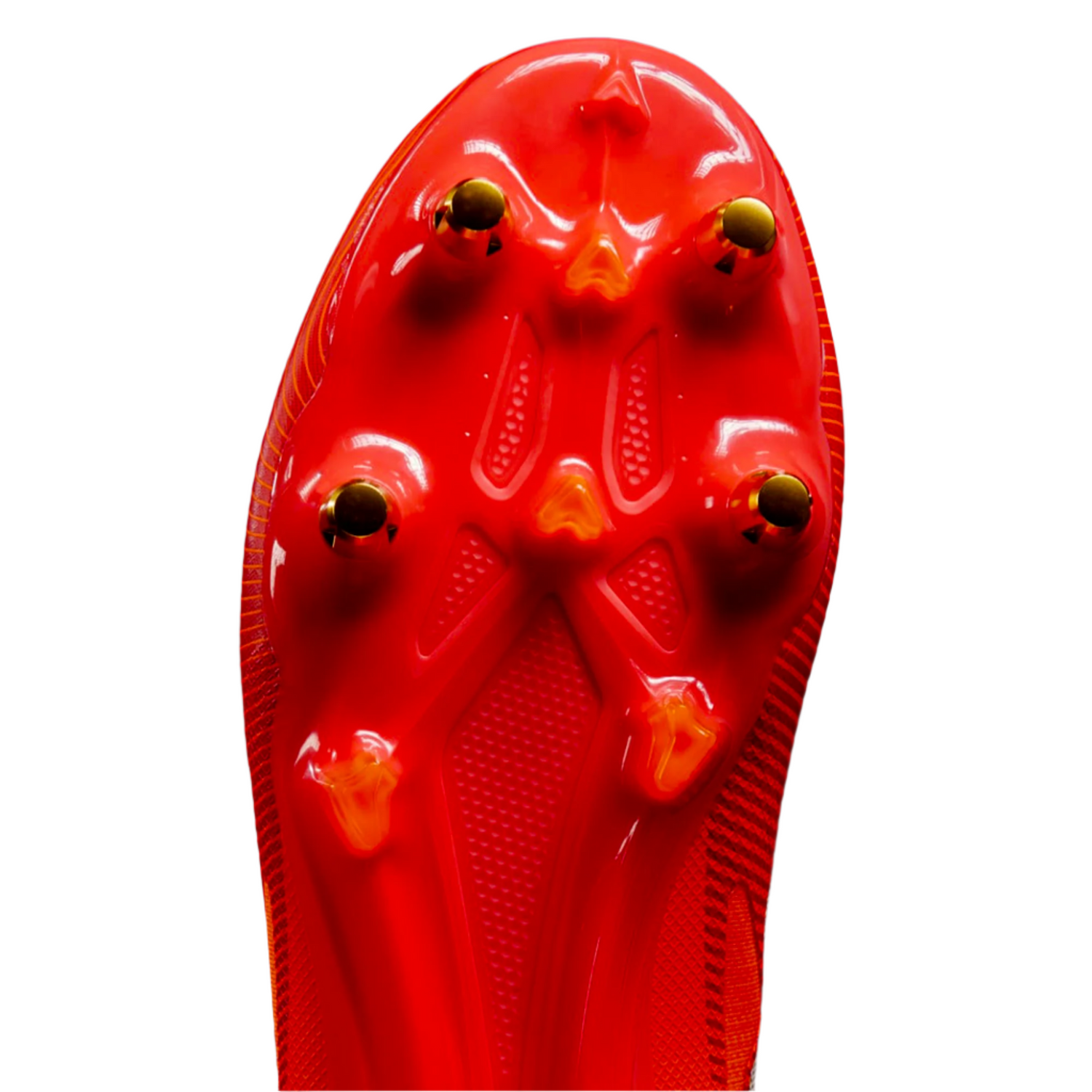 Close-up of the sole of the adidas Adizero RS15 Pro SG in Lucid Red/White/Team Solar Orange, showing five gold-tipped studs for traction on soft ground, like high-performance rugby boots.