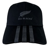 This Adidas All Blacks 3-Stripe Cap, crafted from black cotton twill, showcases the iconic All Blacks logo and a silver fern emblem on the front, complemented by three vertical gray stripes below the logo.