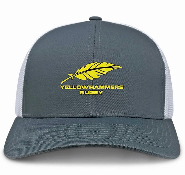 The Montgomery Yellowhammers Trucker Cap by EMB S&S Activewear is a gray and white retro cap with a yellow feather and bold "YELLOWHAMMERS RUGBY" lettering on the front, featuring a snapback closure for adjustable fit.