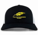 The Montgomery Yellowhammers Trucker Cap by EMB S&S Activewear features a black-and-white retro design, a yellow feather, "YELLOWHAMMERS RUGBY" embroidery on the front, and an adjustable snapback closure.
