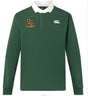 The Exiles Rugby Football Club Solid Dye Rugby Jersey by EMB Canterbury features a green long-sleeve design, white collar, embroidered club crest on the left chest, and a white Canterbury logo on the right chest.