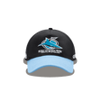 Classic Sportswear's Sharks NRL 25/26 Media Cap in black with a blue brim features an embroidered "Sharks" and stylized shark logo on the front, showcasing sporty sophistication.