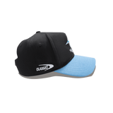 The Sharks NRL 25/26 Media Cap by Classic Sportswear offers a sporty touch with its black design, light blue curved brim, and the "Classic" logo embroidered on the side, making it ideal for Cronulla-Sutherland Sharks fans.