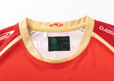 Close-up of a red and gold Dolphins NRL 25/26 Replica Home Jersey, showcasing a "47 23" collar design by Classic Sportswear, with an "NRL AUTHENTICS" label inside, size L.