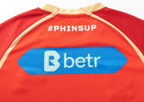 The red Dolphins NRL 25/26 Replica Home Jersey by Classic Sportswear features "PHINSUP" on the back with a white "betr" logo. A must-have for fans!.