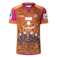 The Gallagher Chiefs Super Rugby Replica Training Jersey 25/26 by Classic Sportswear features brown and orange patterns, a "Chiefs" logo, sponsor logos, stylized feathers, and tribal designs—ideal for fans who love tradition and style.