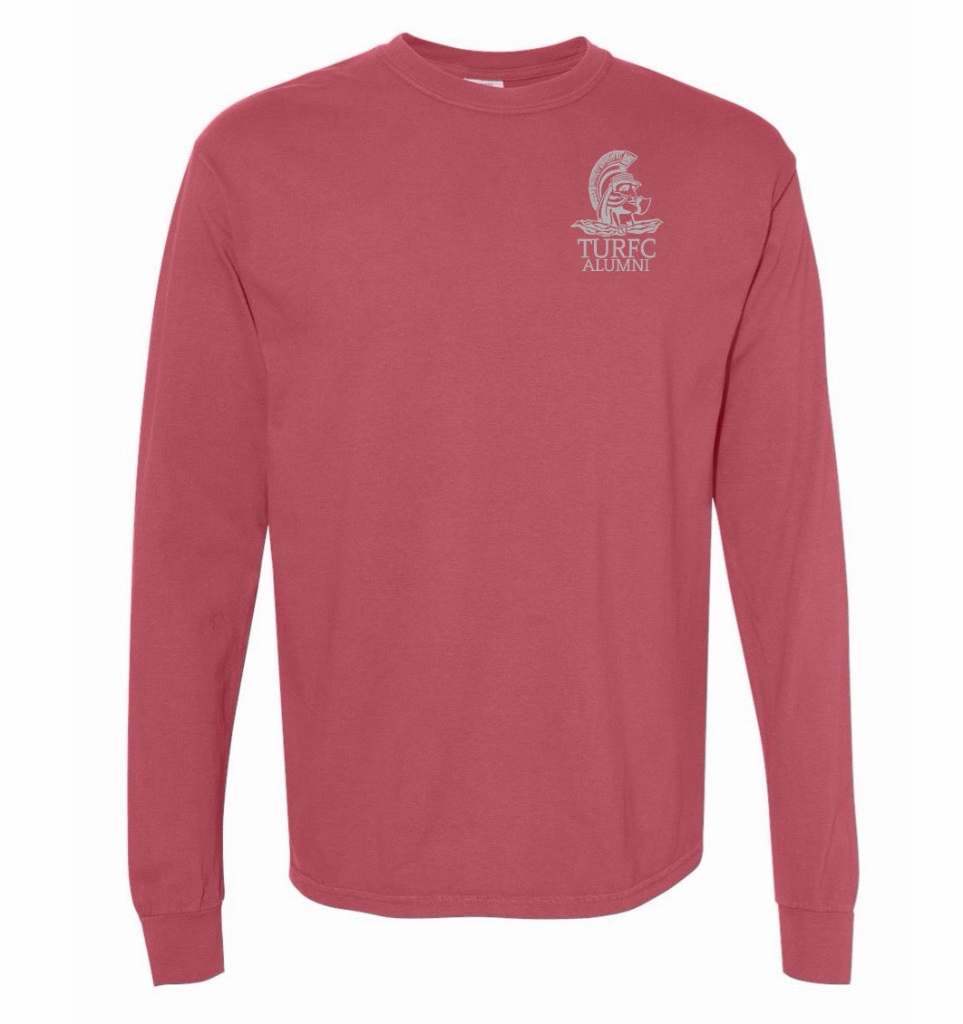 The EMB S&S Activewear Troy Rugby Alumni Heavyweight Comfort Long-Sleeve T-Shirt in red features garment-dyed cotton and a small white "TURFC Alumni" Spartan helmet logo on the chest—ideal for Troy Rugby Alumni.