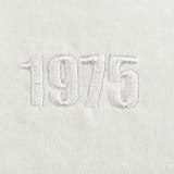 The USA Rugby Elevated Tonal Comfort Tee by EMB Alpha Broder showcases a tone-on-tone design with "1975" beautifully embroidered in white thread on premium ring-spun USA cotton.