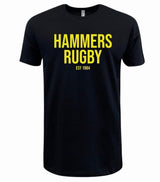 The Montgomery Yellowhammers "Hammers Rugby" Supersoft Tee by WRS LAT is a black unisex cotton t-shirt featuring bold yellow "HAMMERS RUGBY EST 1984" text on the front.