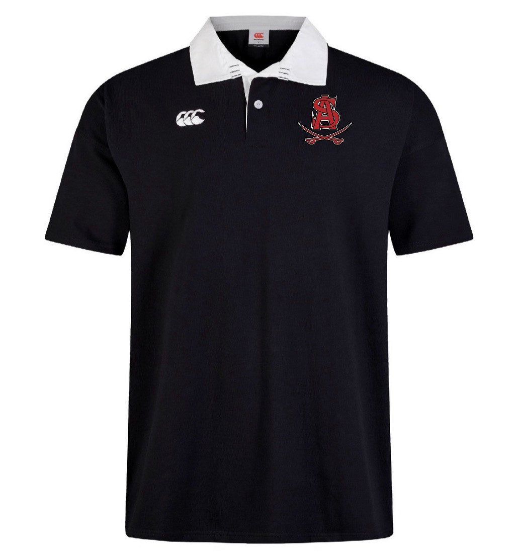 The Archbishop Spalding Solid Classic SS Rugby Jersey by EMB Canterbury is a black short-sleeved polo featuring a white collar, Canterbury branding on the right chest, and a red embroidered "SA" with crossed swords on the left.