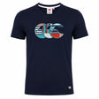 The Canterbury Uglies Logo T-Shirt by Canterbury is a women's rugby tee in navy blue with short sleeves, featuring a multicolored striped "CCC" logo on the chest and a small "CCC" label near the hem. Inspired by the iconic Canterbury rugby shirt style.