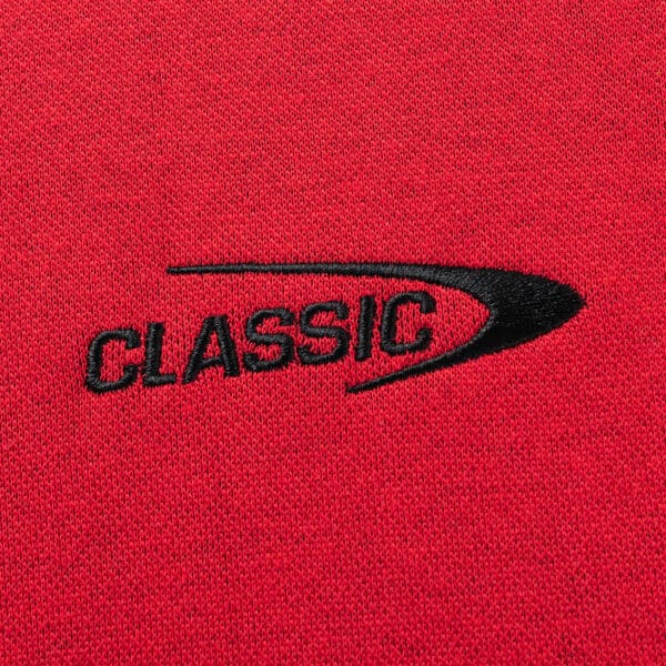 This Limited Edition Crusaders Super Rugby 25/26 Retro Jersey by Classic Sportswear is a heavyweight cotton jersey with "CLASSIC" embroidered in black, featuring a curved design that embodies the timeless elegance of Classic Sportswear branding.