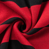 A close-up of the red and black striped heavyweight cotton fabric of the Limited Edition Crusaders Super Rugby 25/26 Retro Jersey by Classic Sportswear, twisted into a spiral pattern.