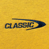 A yellow fabric features "CLASSIC" in blue and a curved line, evoking the Limited Edition Highlanders Super Rugby 25/26 Retro Jersey by Classic Sportswear.