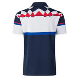 Back view of the Limited Edition Blues Super Rugby 25/26 Retro Jersey by Classic Sportswear displaying a geometric pattern in white, red, and blue on the upper half, with a solid dark blue lower half, echoing classic sportswear design.