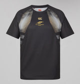 Montgomery Yellowhammers Tempo+ Training Tee by EMB Canterbury – a black athletic short-sleeve shirt featuring white gradient accents on the shoulders and a gold “TULLYVANNINERS RUGBY” logo on the chest. This moisture-wicking rugby tee is designed by Canterbury for optimal comfort and performance during every training session.