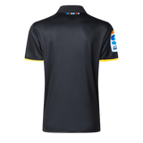 Back view of the Hurricanes Super Rugby 25/26 Team Polo by Classic Sportswear in dark with colorful collar stripes and the Hurricanes Super Rugby logo on the right sleeve, echoing classic sportswear style.