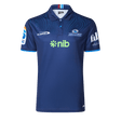 The Blues Super Rugby 25/26 Team Polo by Classic Sportswear is a blue jersey featuring short sleeves, a subtle circular pattern, and logos including "nib" and "Blues," perfect for any Blues fan.