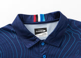 The Blues Super Rugby 25/26 Team Polo by Classic Sportswear features light blue lines, colored tags inside the collar, and has a tag reading "Classic Sportswear Large." Ideal for any Blues fan wanting to flaunt their team spirit.