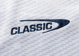 Embroidered "CLASSIC" in navy on textured white, inspired by the curved design of the Blues Super Rugby 25/26 Replica Away Jersey from Classic Sportswear.