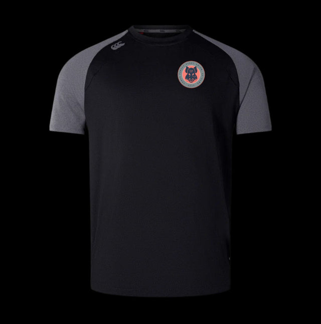 The Armed Forces RFU Okinawa Elite Training Tee by EMB Canterbury is a black and gray short-sleeve performance shirt with Vapodri fabric, featuring a chest badge with a red wolf head logo and a CCC logo on the shoulder.