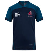The Washington State Rugby Vapodri Evader Jersey by EMB Canterbury has a navy blue design with teal accents, a Canterbury neckline, and "Canterbury" and "Rugby" logos on the chest, enhanced by VapoDri technology.