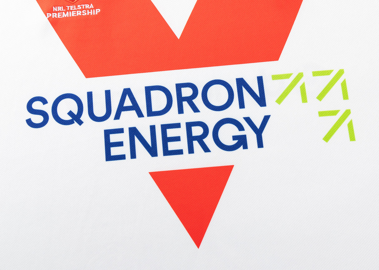 The Squadron Energy logo, with its bold red "V" and small green arrows on a white background, mirrors the design elements of the Dragons NRL 25/26 Replica Home Jersey by Classic Sportswear.