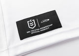A white fabric label with a black patch and white text reads "NRL Telstra Premiership Official Product" beside the Classic logo, identifying the Dragons NRL 25/26 Replica Home Jersey by Classic Sportswear.