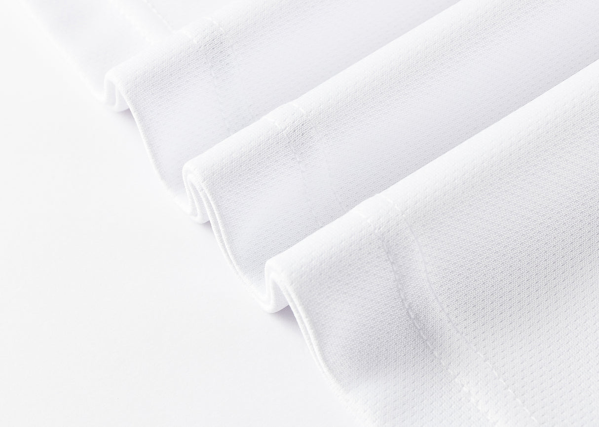 Close-up of folded white textured fabric resembling intricate details of Classic Sportswear's Dragons NRL 25/26 Replica Home Jersey.