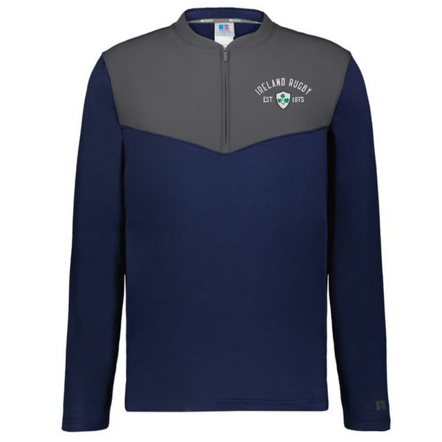 The EMB Augusta Nations of Rugby Ireland 1875 Sideline Grid 1/4 Zip Pullover in navy and gray features "Ireland Rugby Est. 1875" with a shamrock logo on the left chest—perfect for any Ireland rugby fan.