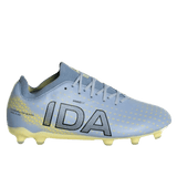 The IDA Helia Club FG - Light Blue by IDA Sports is a women's soccer cleat with yellow accents and studs, "IDA" text on the side, engineered as firm ground boots for top female football performance.