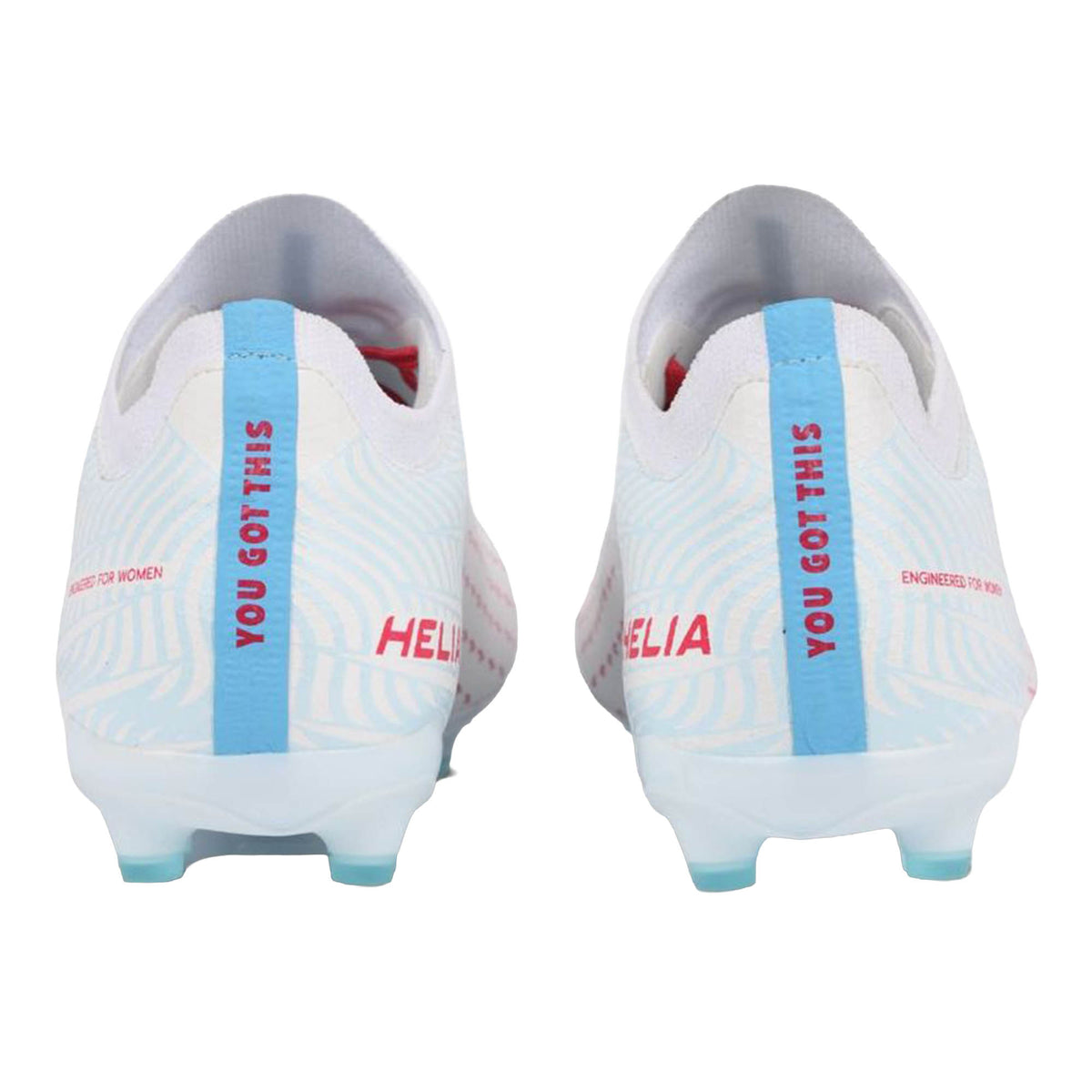 Back view of two white IDA Helia Club FG/AG women’s soccer cleats by IDA Sports, featuring blue soles and stripes with “YOU GOT THIS” and “HELIA” printed in red—ideal beginner boots for aspiring players.