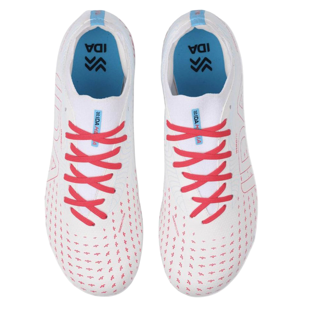 A pair of IDA Sports IDA Helia Club FG/AG women’s soccer cleats in white and blue, featuring red laces, a blue interior, and patterned pink dots, viewed from above.