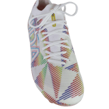 The IDA Sports Helia Elite Limited Edition Pride FG is a white firm ground shoe inspired by women’s soccer cleats, featuring colorful diagonal lines, geometric patterns, white laces, and a yellow tongue label.