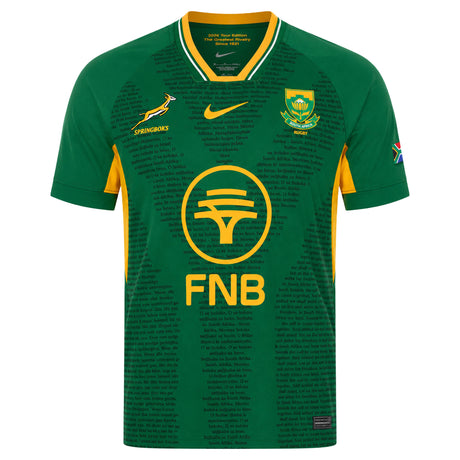 Introducing the Springboks 26/27 Greatest Rivalry Replica Home Jersey by Nike. This authentic replica rugby jersey features iconic green with yellow accents, sponsor logos, the Springboks emblem, and a subtle printed text pattern. Complete with the South African flag on the sleeve, it’s the perfect choice for dedicated fans of Nike and South Africa rugby.