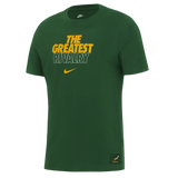 The Nike Springboks 26/27 Greatest Rivalry T-Shirt is a green tee showcasing “THE GREATEST RIVALRY” in bold yellow and white, a small yellow Nike swoosh, and a Springboks logo patch at the bottom right.