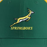 The Nike Springboks 26/27 Trucker Cap features a green design with an embroidered yellow and white leaping springbok logo above "SPRINGBOKS" in yellow text.