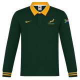 The Nike Springboks 26/27 Classic Long Sleeve Home Jersey features a green design, yellow collar, Springboks logo, and SA flag patch—perfect as the team’s official home jersey.