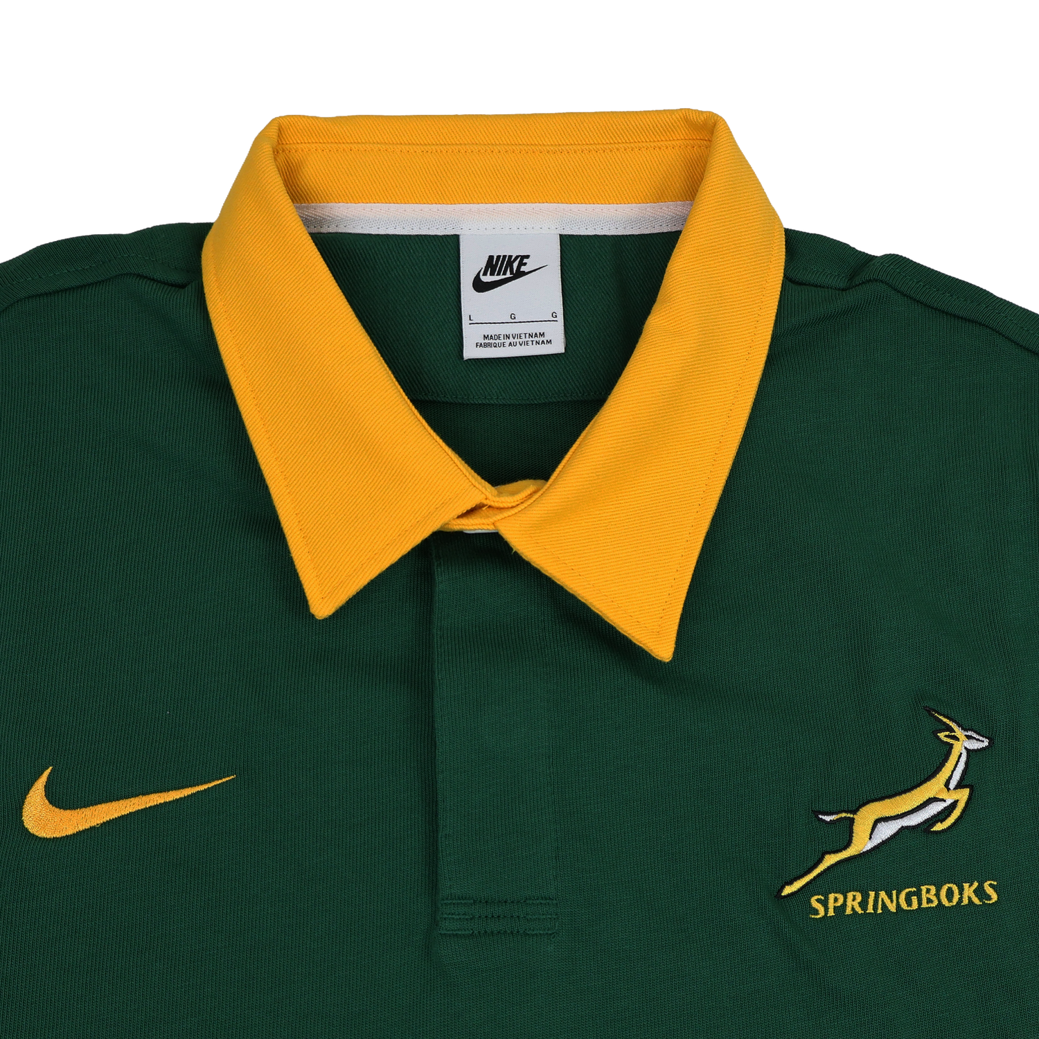 The Springboks 26/27 Classic Long Sleeve Home Jersey by Nike features a green design with a yellow collar, yellow Nike logo, and Springboks emblem on the chest, plus an authentic Nike rugby shirt tag inside the collar.