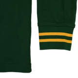 Close-up of the Nike Springboks 26/27 Classic Long Sleeve Home Jersey, dark green with yellow double-striped cuffs.